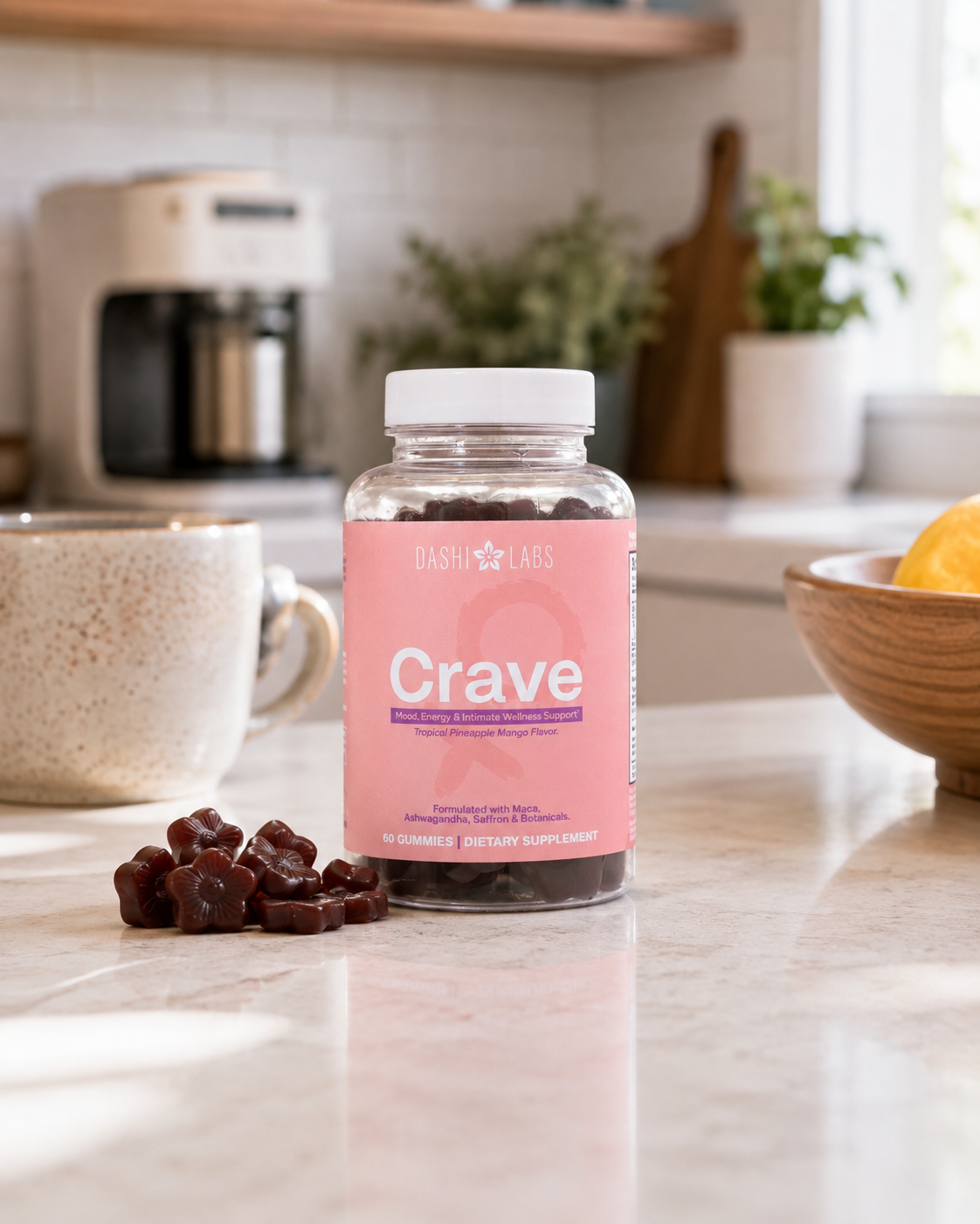 Crave Gummies bottle on a kitchen counter with flower-shaped gummies